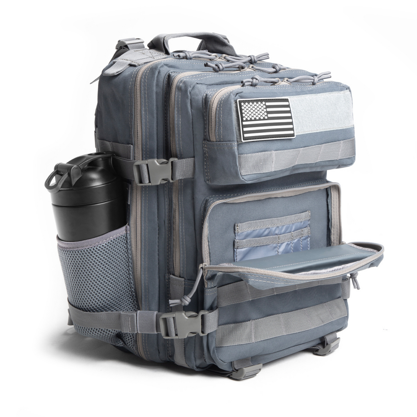 Gray tactical backpack with American flag patch on a white background