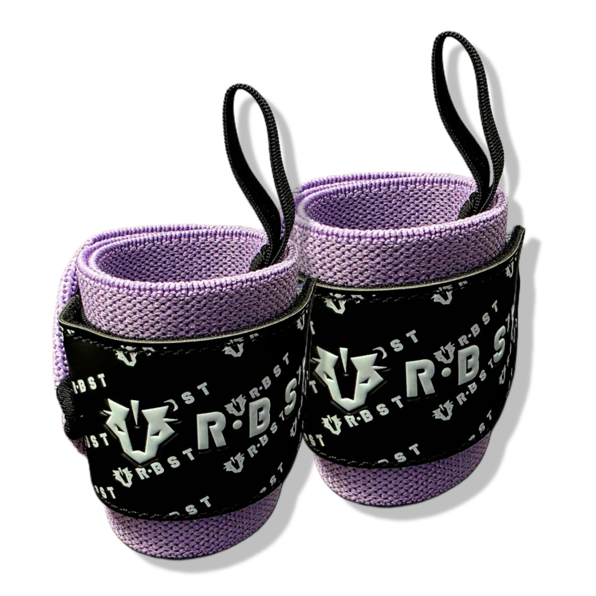 Pair of purple wrist wraps with black straps and branding on a white background