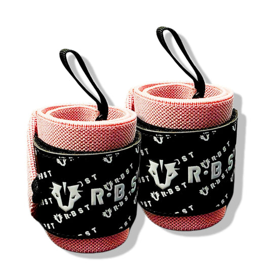 Two pink wrist wraps with black straps and a visible brand logo on a white background