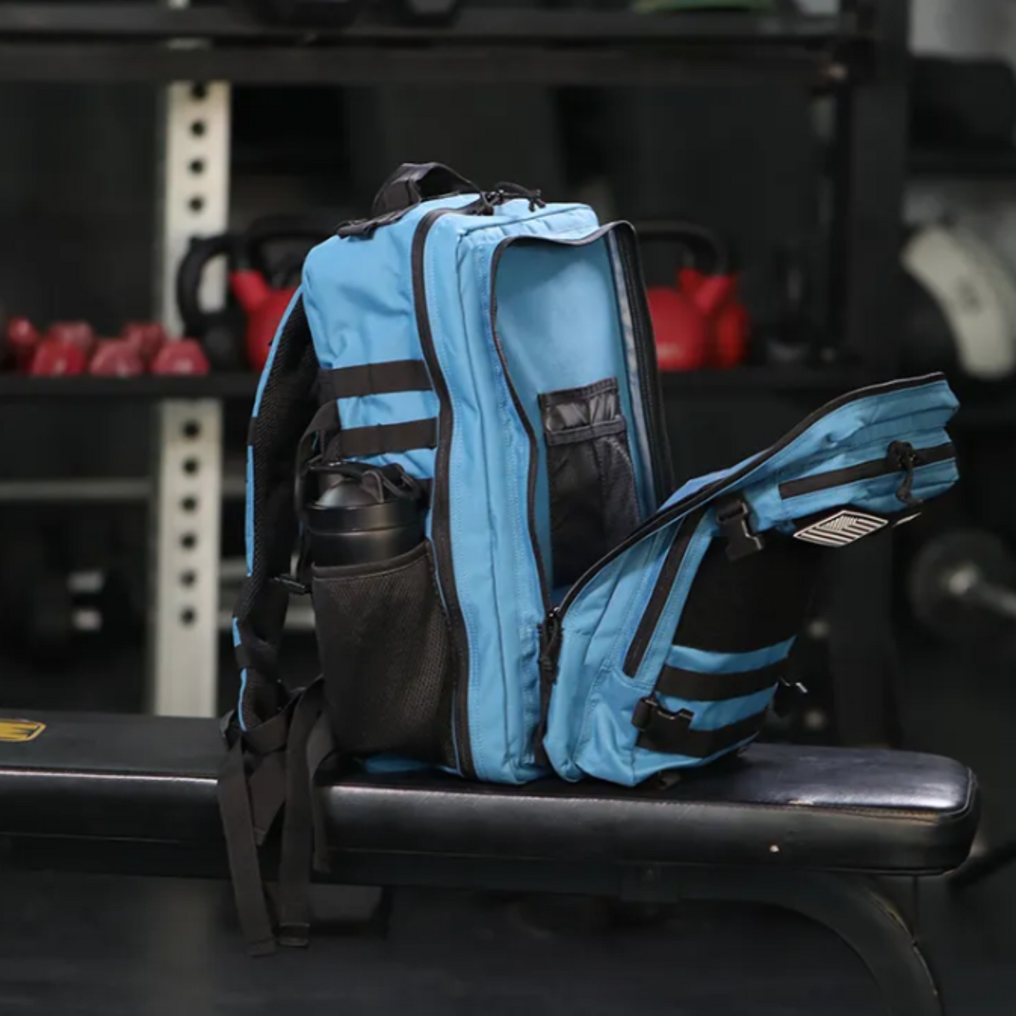 Back view of the tactical backpack, showcasing padded straps, breathable back panel, and adjustable features.