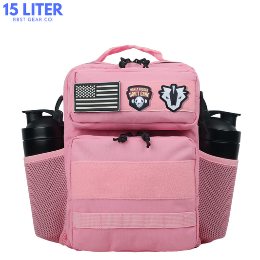 Pink backpack with patches and water bottles on a white background