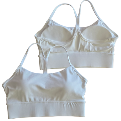 Two white sports bras on a white background