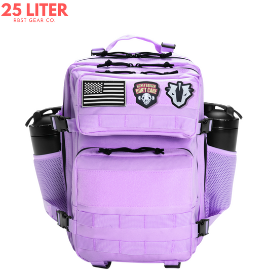 Purple backpack with patches on a white background