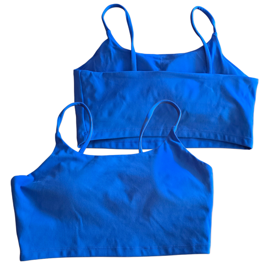 Two blue crop tops on a white background
