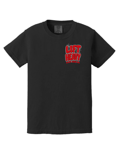 A black short-sleeve crewneck t-shirt with a red and white 'Lift Heavy' graphic printed on the left chest, displayed against a solid white background.