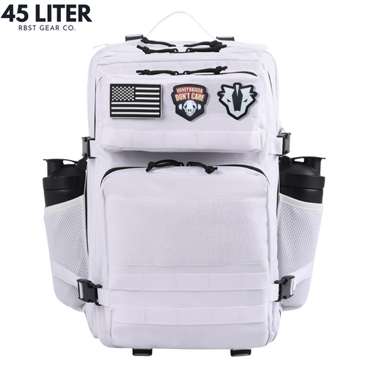 White backpack with various patches on a white background, featuring '45 Liter' and 'RBST GEAR CO.' text.