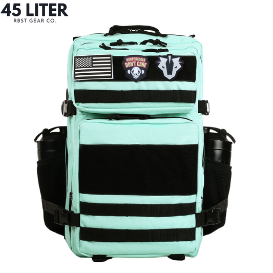 Light blue backpack with patches on a white background, featuring '45 Liter' and 'RBST GEAR CO.' text.