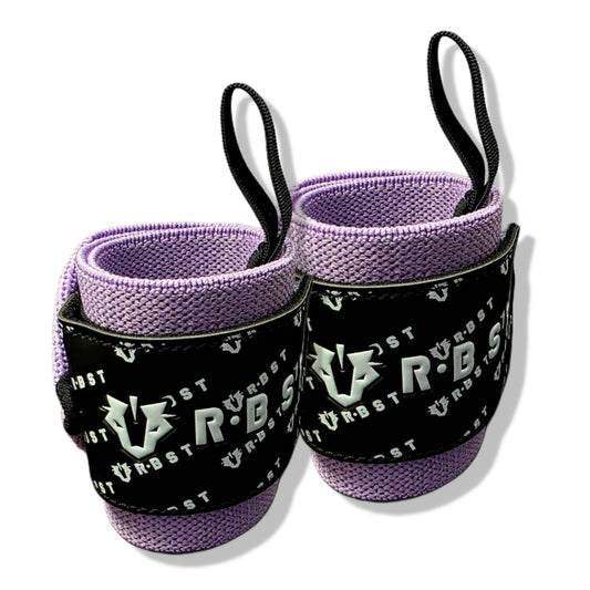 Pair of purple wrist wraps with black straps and branding on a white background